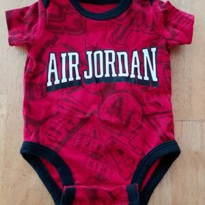 Jordan Newborn Red and Black Onesie